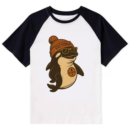 Victoria Orca wearing Victoria beanie with pom pom and wayfarer sunglasses - Contrast Raglan T-shirt - Black