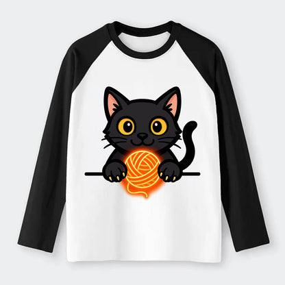 Midnight the black cat popping out of a gift box lid with ribbon - Raglan Long Sleeve T-Shirt - Black