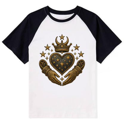 Weathered antique brass crown above a hammered gunmetal heart framed by - Contrast Raglan T-shirt - Black