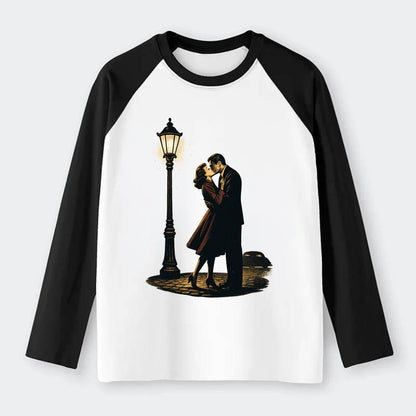 first kiss under vintage street lamp on cobblestone at night - Raglan Long Sleeve T-Shirt - Black
