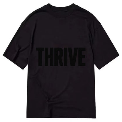 Bold typography design - "THRIVE" - flourishing, doing well - Classic T-shirt - Black