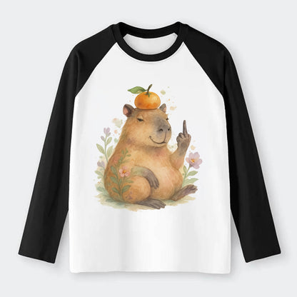 chonky capybara relaxing with orange on head, one webbed middle finger - Raglan Long Sleeve T-Shirt - Black