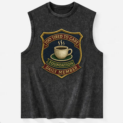 Crest with coffee cup - "Too Tired To Care Foundation - Daily Member" - - Vintage Washed Tank - Black