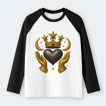 Sun goddess crown radiating golden rays over a midnight heart with - Raglan Long Sleeve T-Shirt - Black