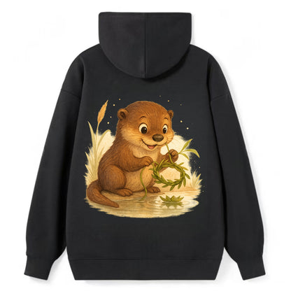 Otter weaving river reeds into a floating crown beside mirror-still water - Classic Pullover Hoodie - Black