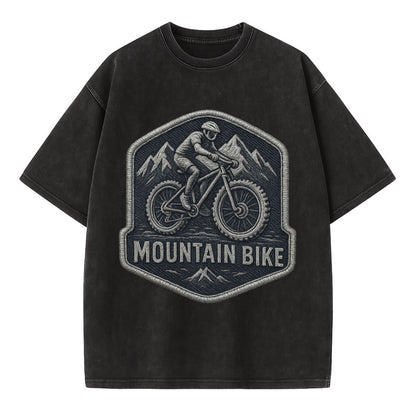Mountain bike with rugged tires - cyclist badge - Vintage T-shirt - Black