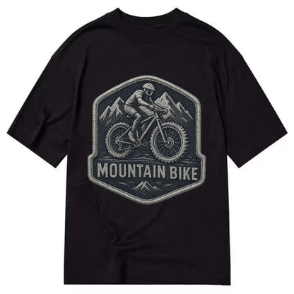 Mountain bike with rugged tires - cyclist badge - Classic T-shirt - Black