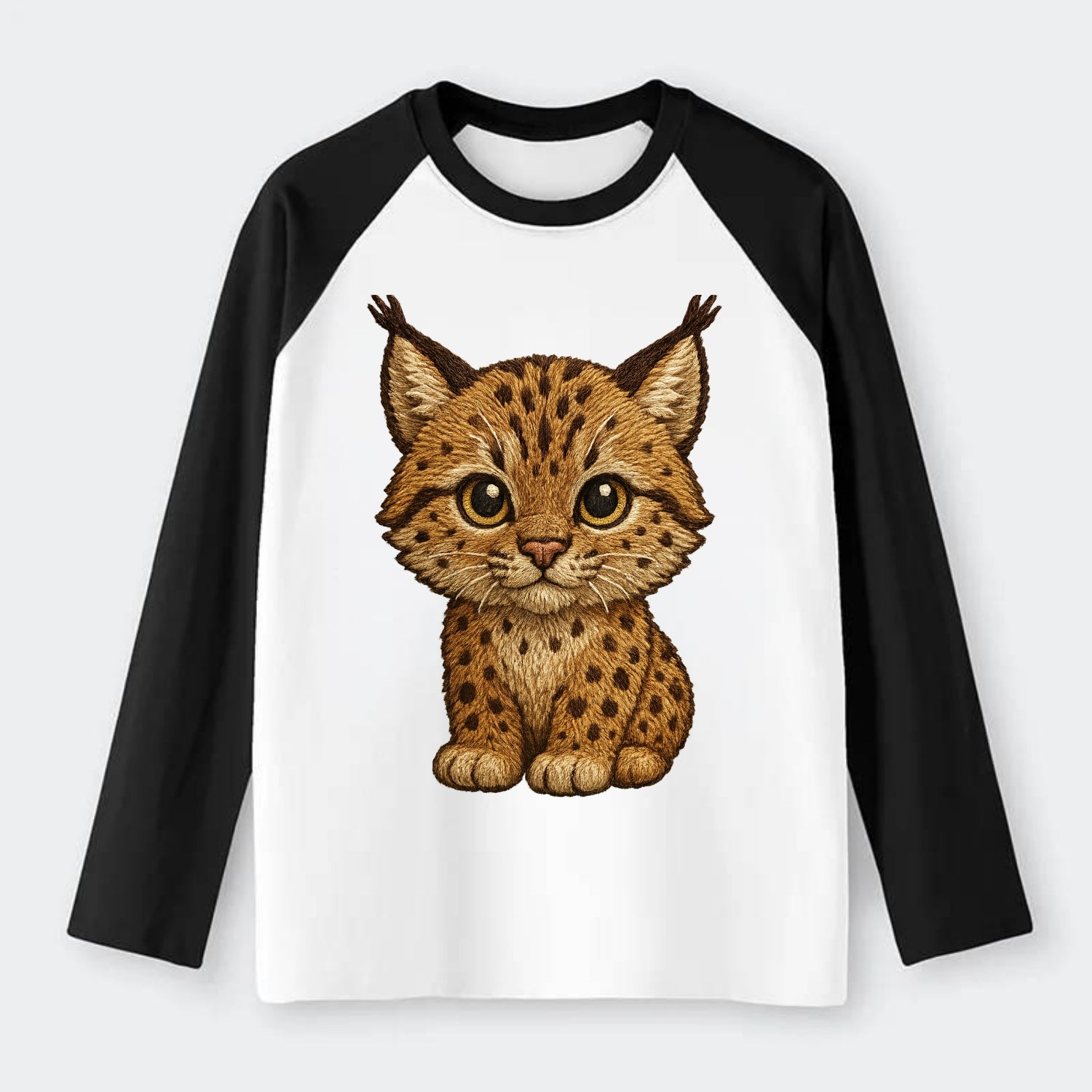 Baby Lynx Cub - tufted ears, spotted fur, golden eyes, front-facing, - Raglan Long Sleeve T-Shirt - Black