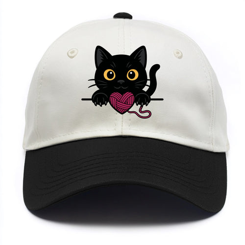 Midnight the black cat stretching tall with claws gently hooked over the edge. - Two Tone Cap