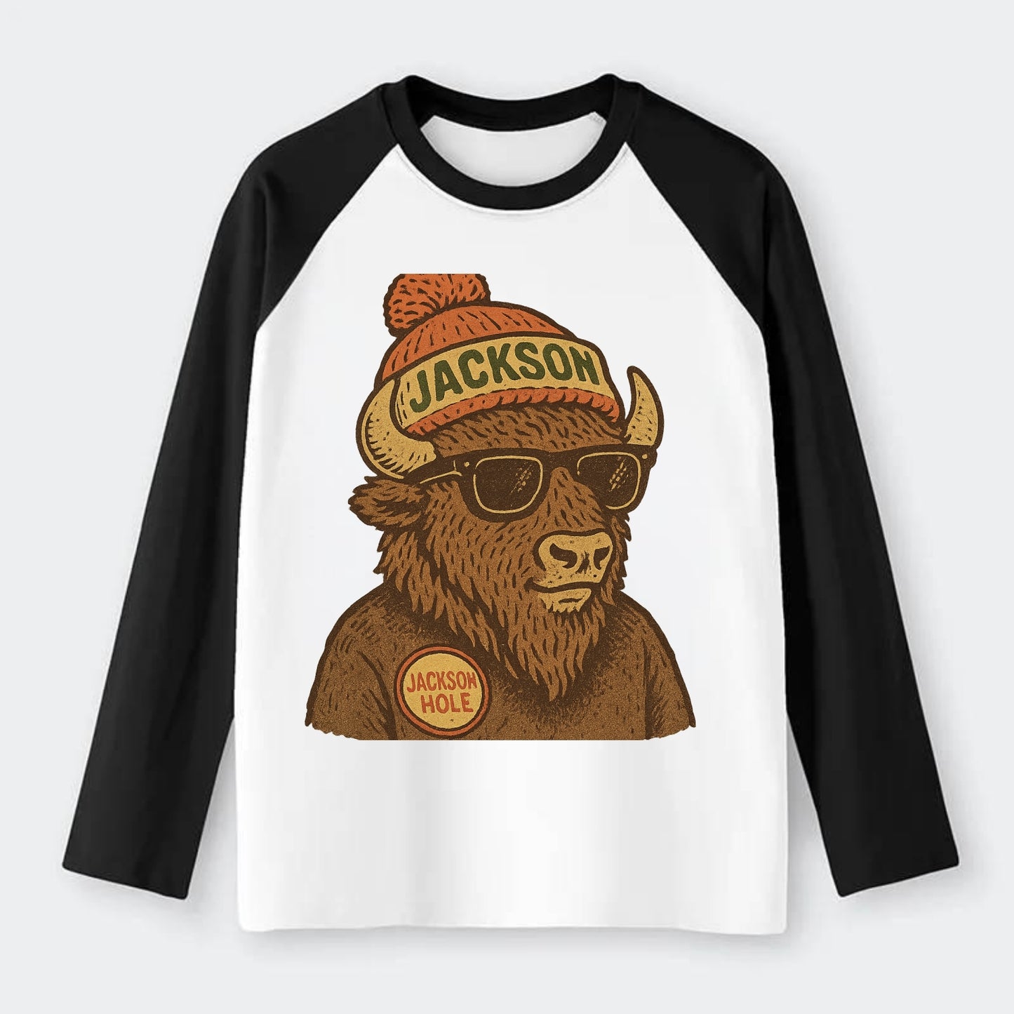 Jackson Hole Bison wearing Jackson beanie with pom pom and wayfarer - Raglan Long Sleeve T-Shirt - Black