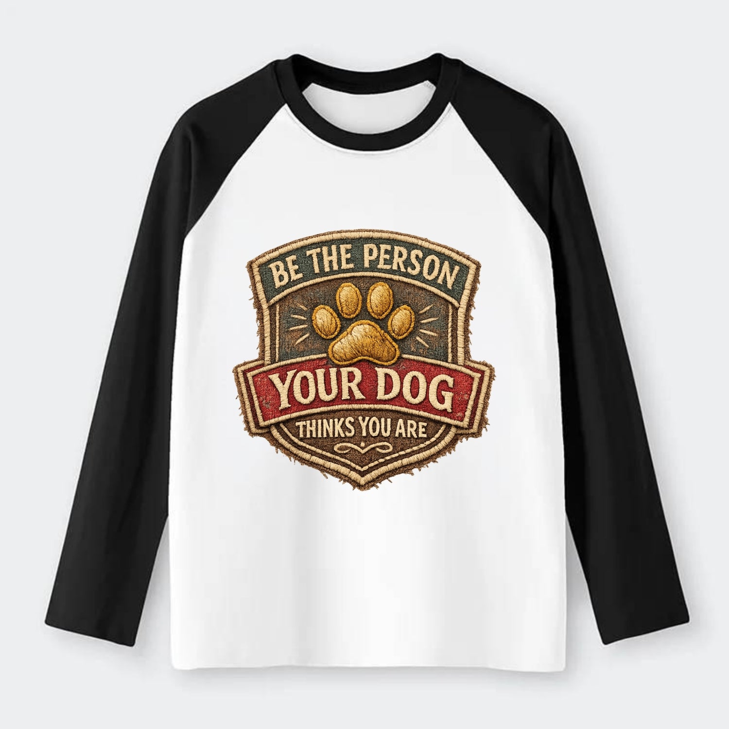 BE THE PERSON YOUR DOG THINKS YOU ARE - inspirational with paw in gold - Raglan Long Sleeve T-Shirt - Black