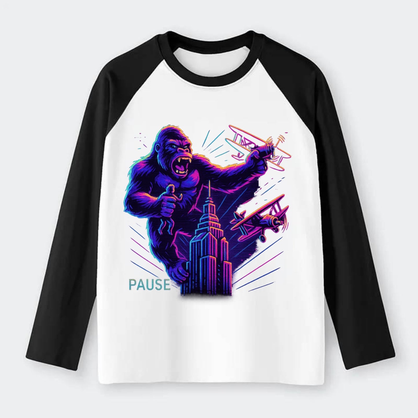 giant gorilla on top of skyscraper holding small figure, swatting - Raglan Long Sleeve T-Shirt - Black