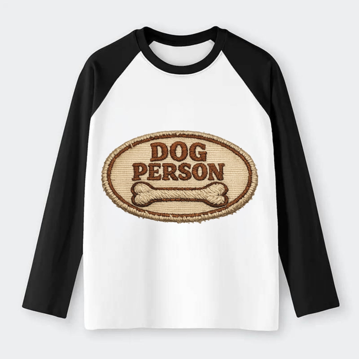 DOG PERSON - simple text with bone in brown , team dog - Raglan Long Sleeve T-Shirt - Black