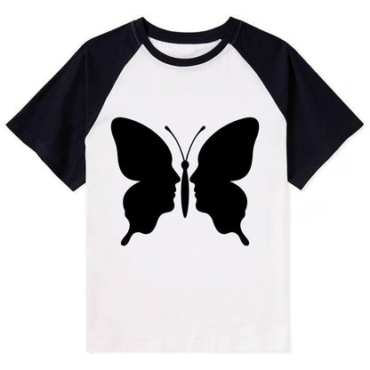 Butterfly wings - negative space reveals hidden faces or patterns - Contrast Raglan T-shirt - Black