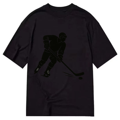 Ice hockey player shooting puck - Classic T-shirt - Black