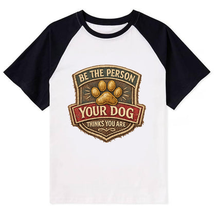 BE THE PERSON YOUR DOG THINKS YOU ARE - inspirational with paw in gold , - Contrast Raglan T-shirt - Black
