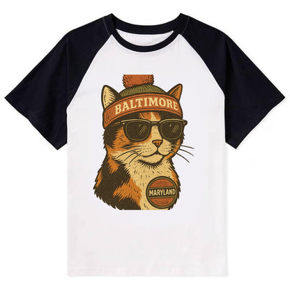 Maryland Calico Cat wearing Baltimore beanie with pom pom and wayfarer - Contrast Raglan T-shirt - Black