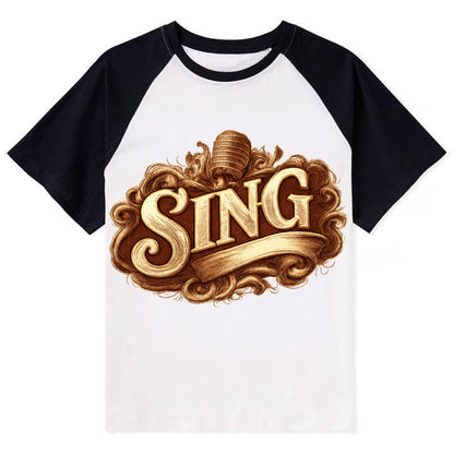 Bold typography design - "SING" - vocal expression, musical soul - Contrast Raglan T-shirt - Black
