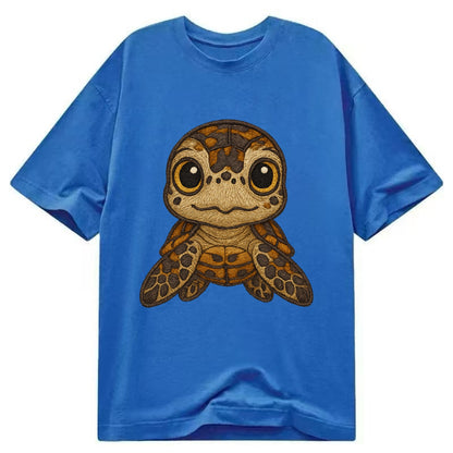 Baby Hawksbill Turtle - amber and brown shell pattern, curious golden eyes, - Classic T-shirt - Blue