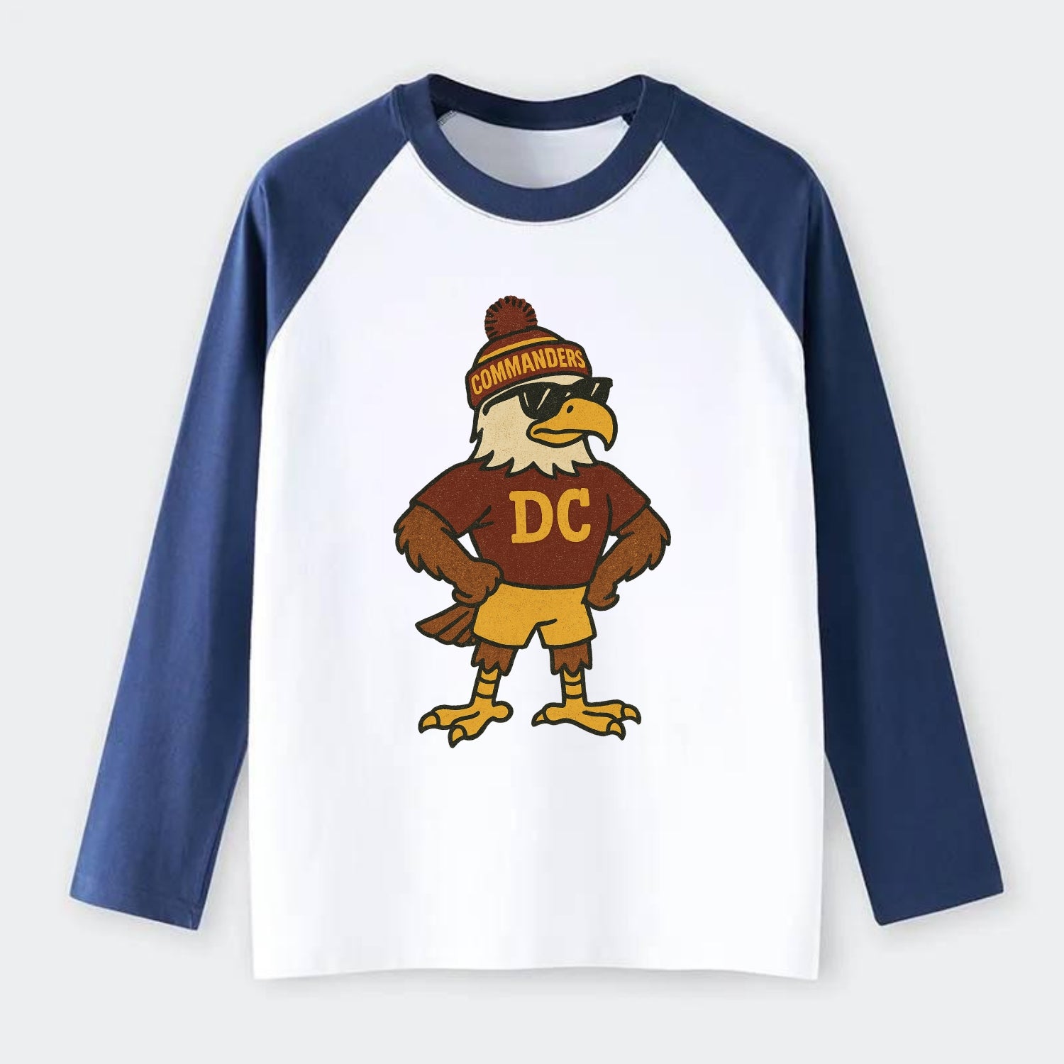 DC Eagle wearing Commanders burgundy and gold beanie with pom pom and - Raglan Long Sleeve T-Shirt - Blue