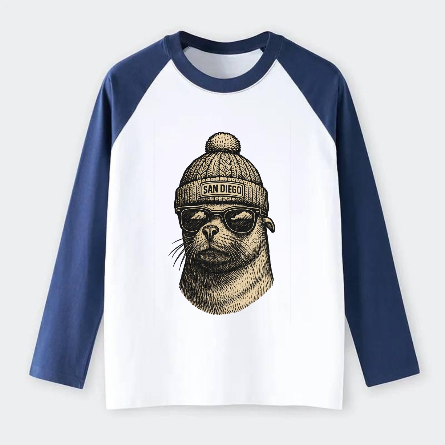 San Diego Sea Lion wearing San Diego beanie with pom pom and wayfarer - Raglan Long Sleeve T-Shirt - Blue