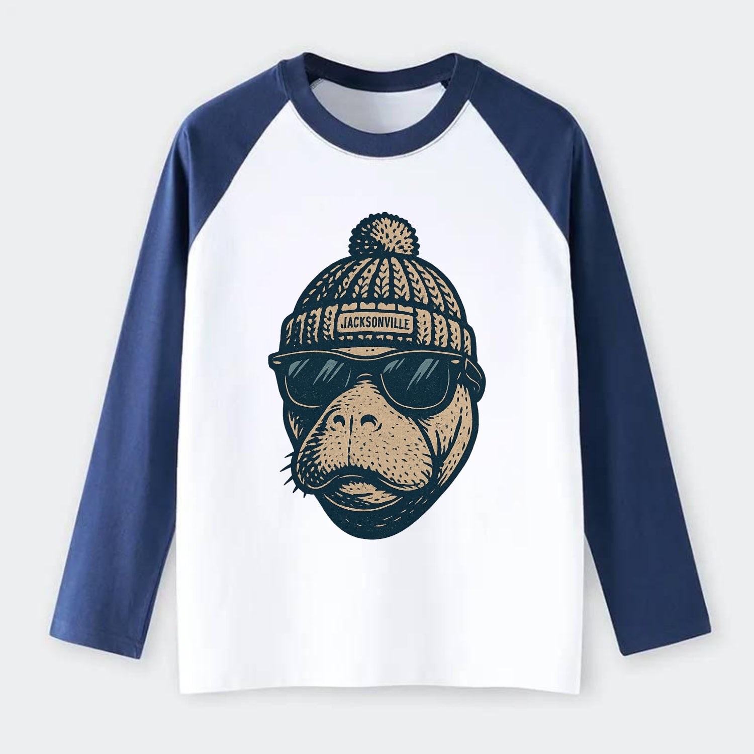Jacksonville Manatee wearing Jacksonville beanie with pom pom and - Raglan Long Sleeve T-Shirt - Blue