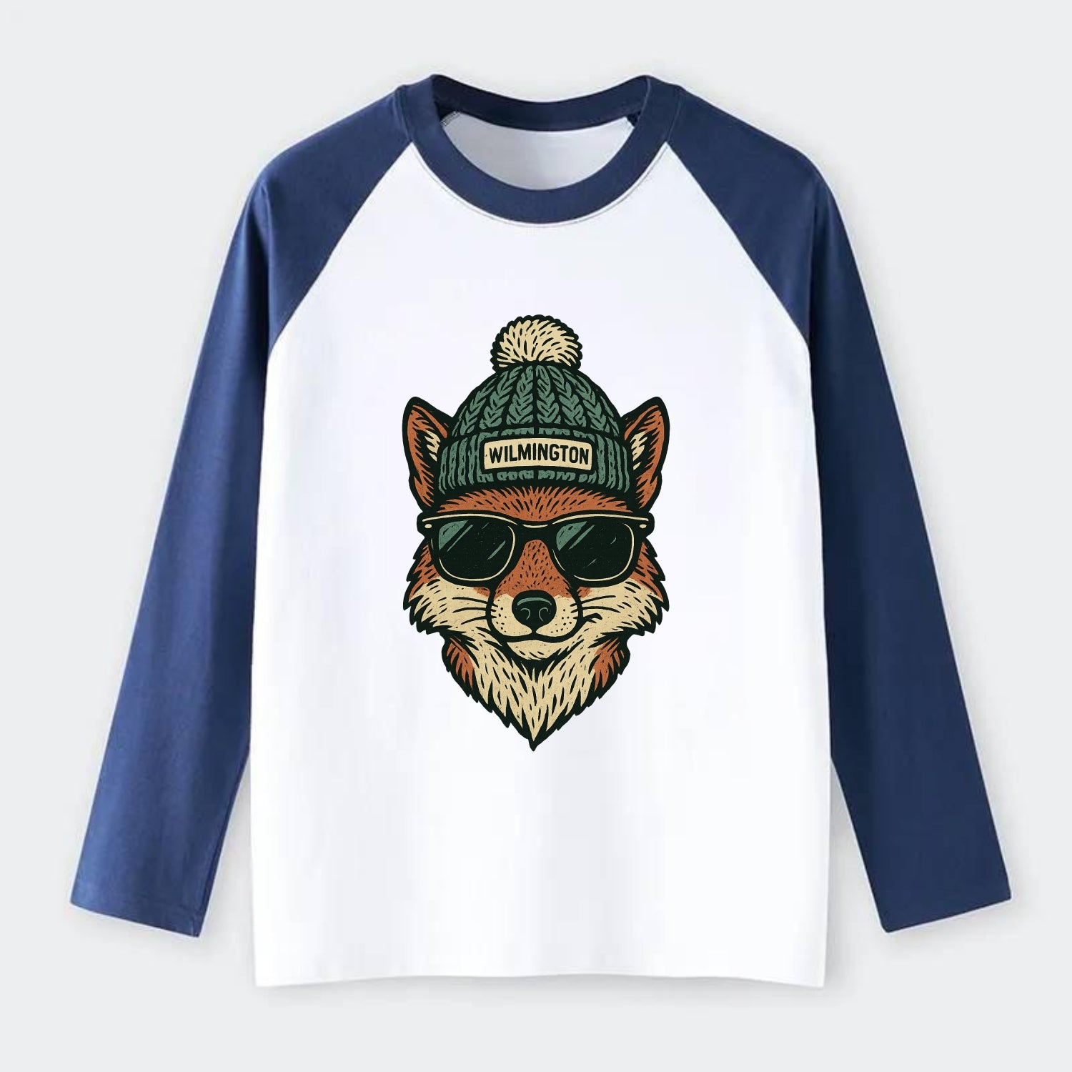 Delaware Gray Fox wearing Wilmington beanie with pom pom and wayfarer - Raglan Long Sleeve T-Shirt - Blue