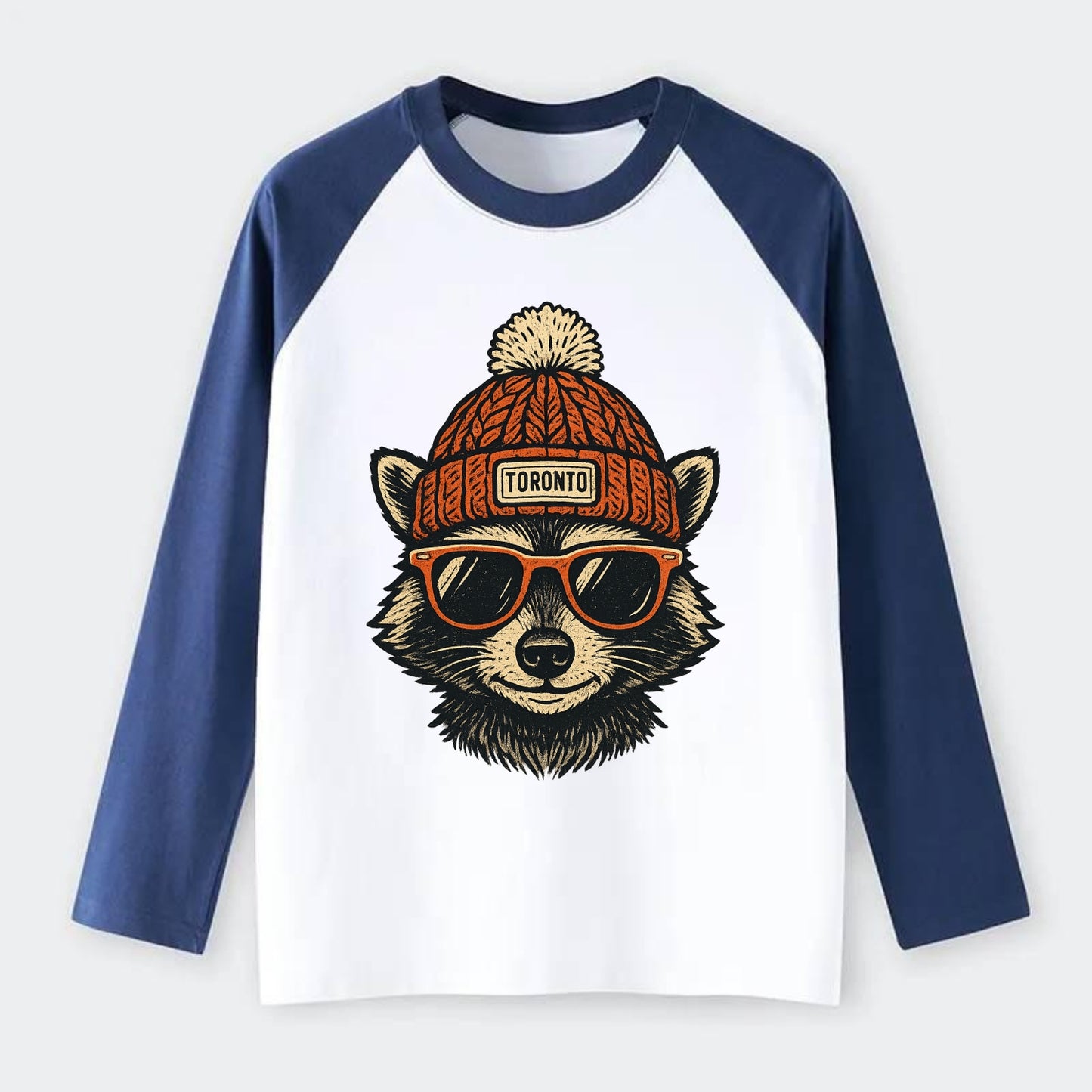 Toronto Raccoon wearing Toronto beanie with pom pom and wayfarer - Raglan Long Sleeve T-Shirt - Blue