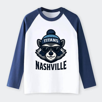 Nashville Raccoon wearing Titans navy and light blue beanie with pom - Raglan Long Sleeve T-Shirt - Blue