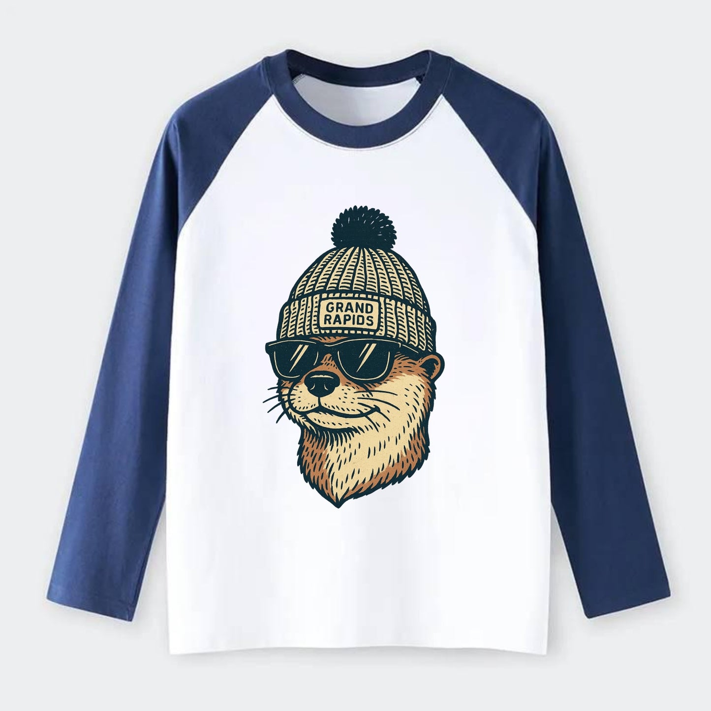 Grand Rapids River Otter wearing Grand Rapids beanie with pom pom and - Raglan Long Sleeve T-Shirt - Blue