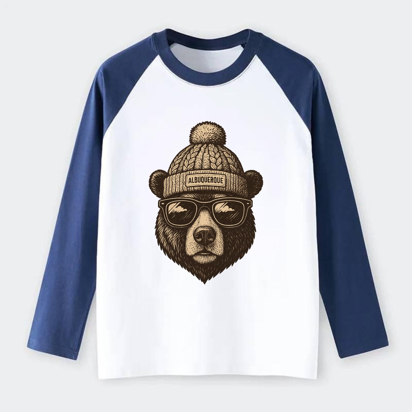 New Mexico Black Bear wearing Albuquerque beanie with pom pom and - Raglan Long Sleeve T-Shirt - Blue
