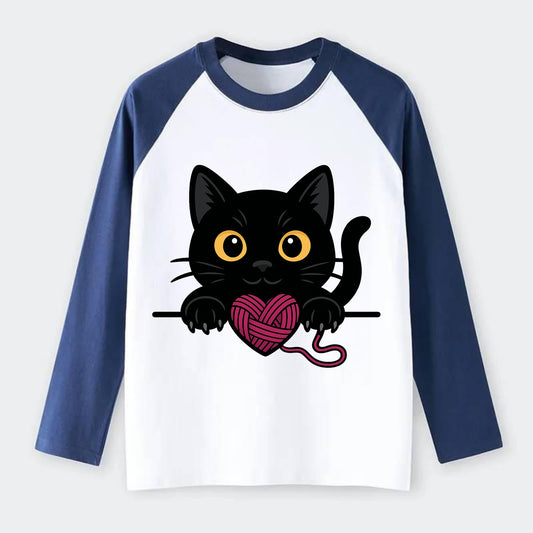Midnight the black cat stretching tall with claws gently hooked over - Raglan Long Sleeve T-Shirt - Blue