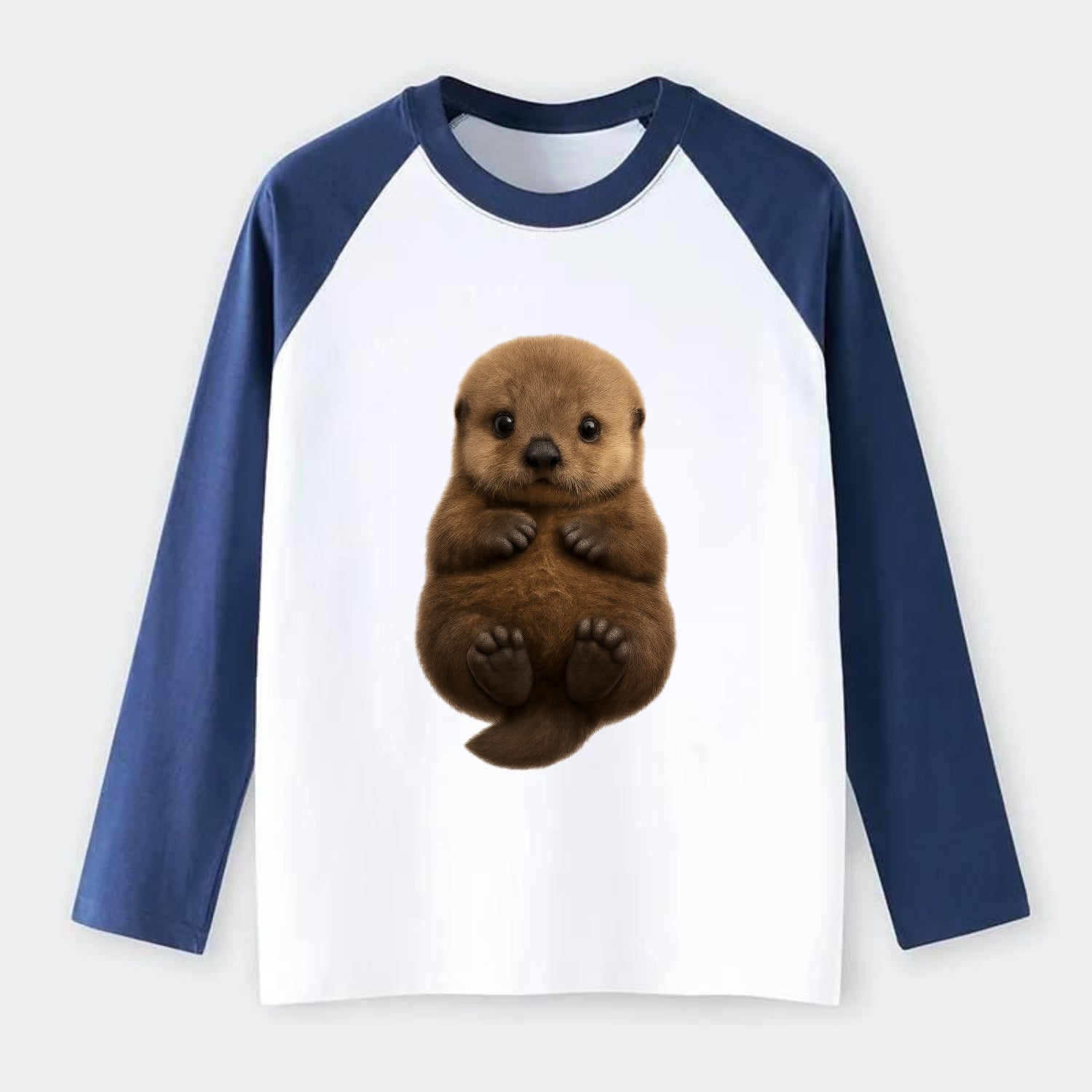 Baby Sea Otter - brown fluffy, floating on back, tiny paws, bright - Raglan Long Sleeve T-Shirt - Blue