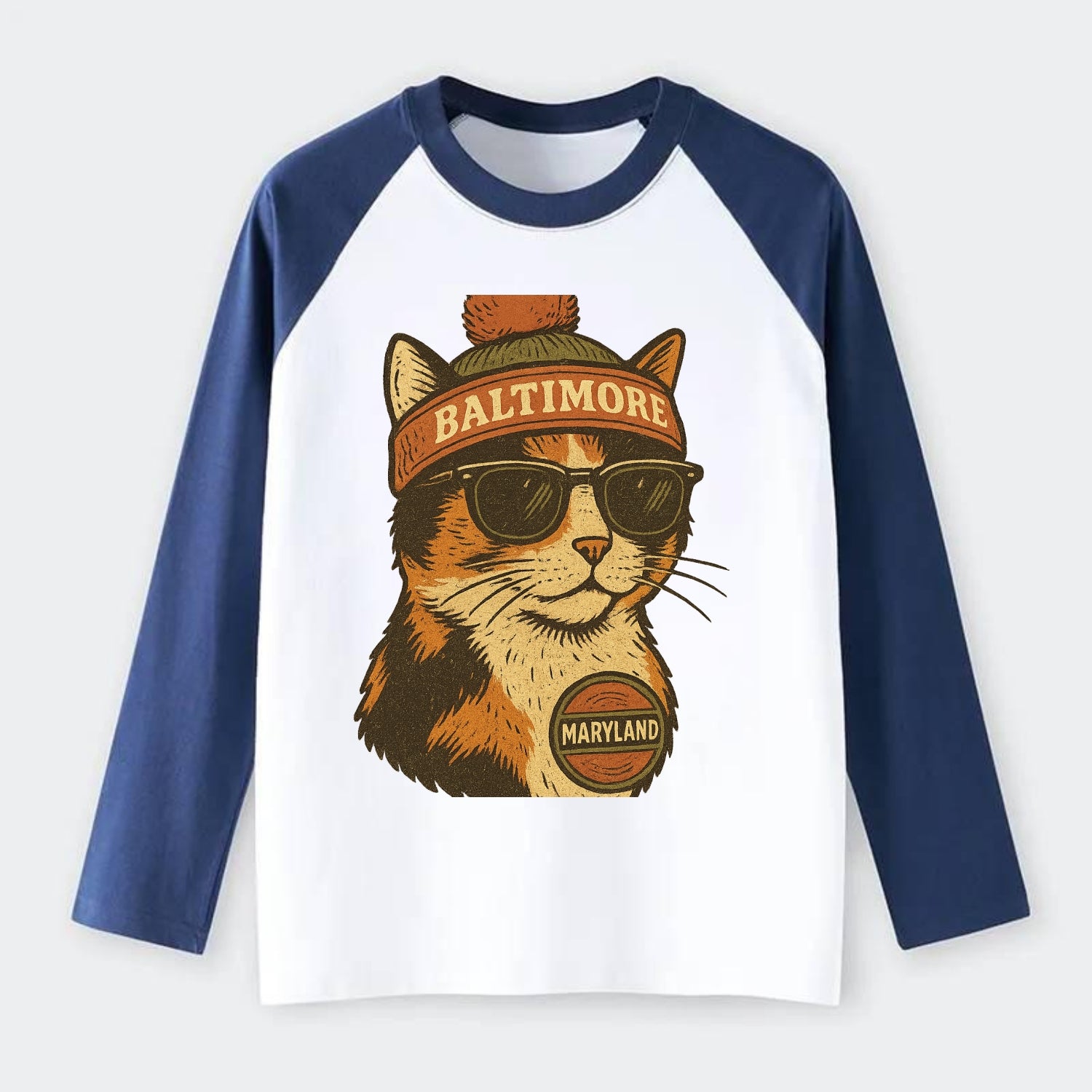 Maryland Calico Cat wearing Baltimore beanie with pom pom and wayfarer - Raglan Long Sleeve T-Shirt - Blue