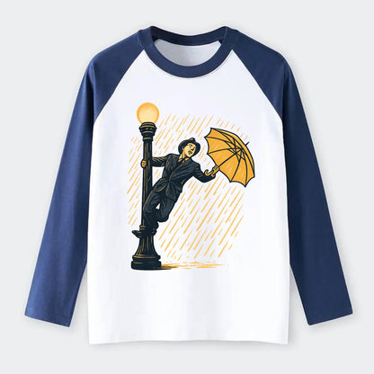 joyful dancing on lamppost in heavy rain with big smile - Raglan Long Sleeve T-Shirt - Blue