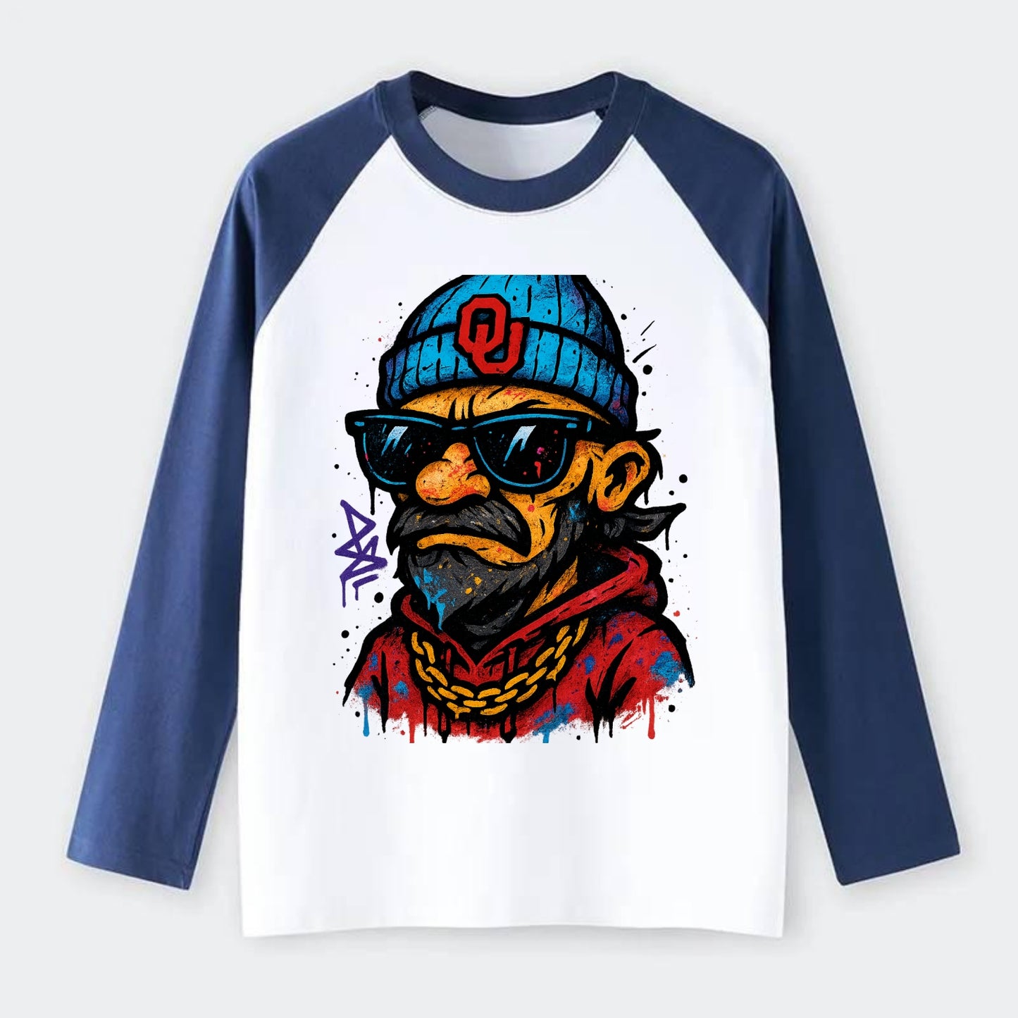 Norman Sooner wearing Oklahoma beanie with OU patch - Raglan Long Sleeve T-Shirt - Blue