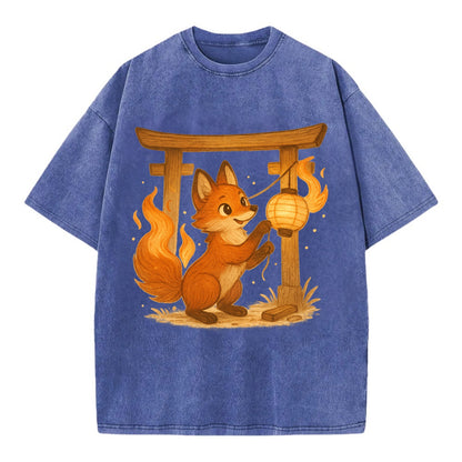 Foxfire kitsune stringing lanterns along a torii gate with tails of living flame - Vintage T-shirt - Blue