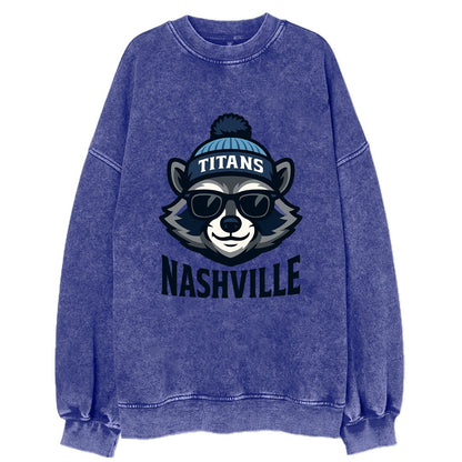 Nashville Raccoon wearing Titans navy and light blue beanie with pom pom and - Vintage Sweatshirt - Blue