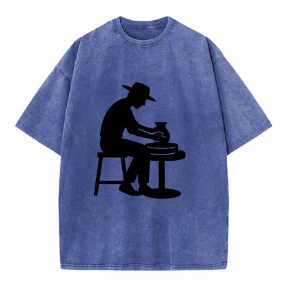 Potter shaping clay on wheel - Vintage T-shirt - Blue