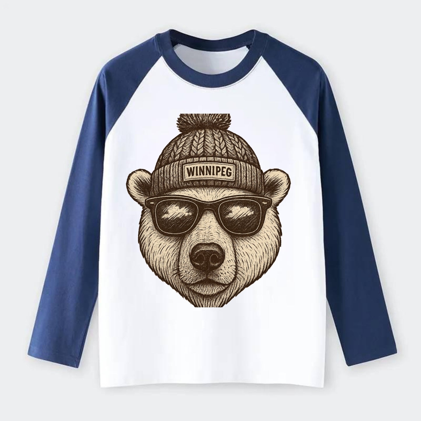 Winnipeg Polar Bear wearing Winnipeg beanie with pom pom and wayfarer - Raglan Long Sleeve T-Shirt - Blue