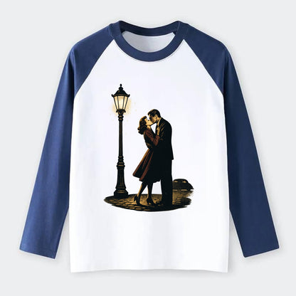 first kiss under vintage street lamp on cobblestone at night - Raglan Long Sleeve T-Shirt - Blue