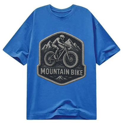 Mountain bike with rugged tires - cyclist badge - Classic T-shirt - Blue