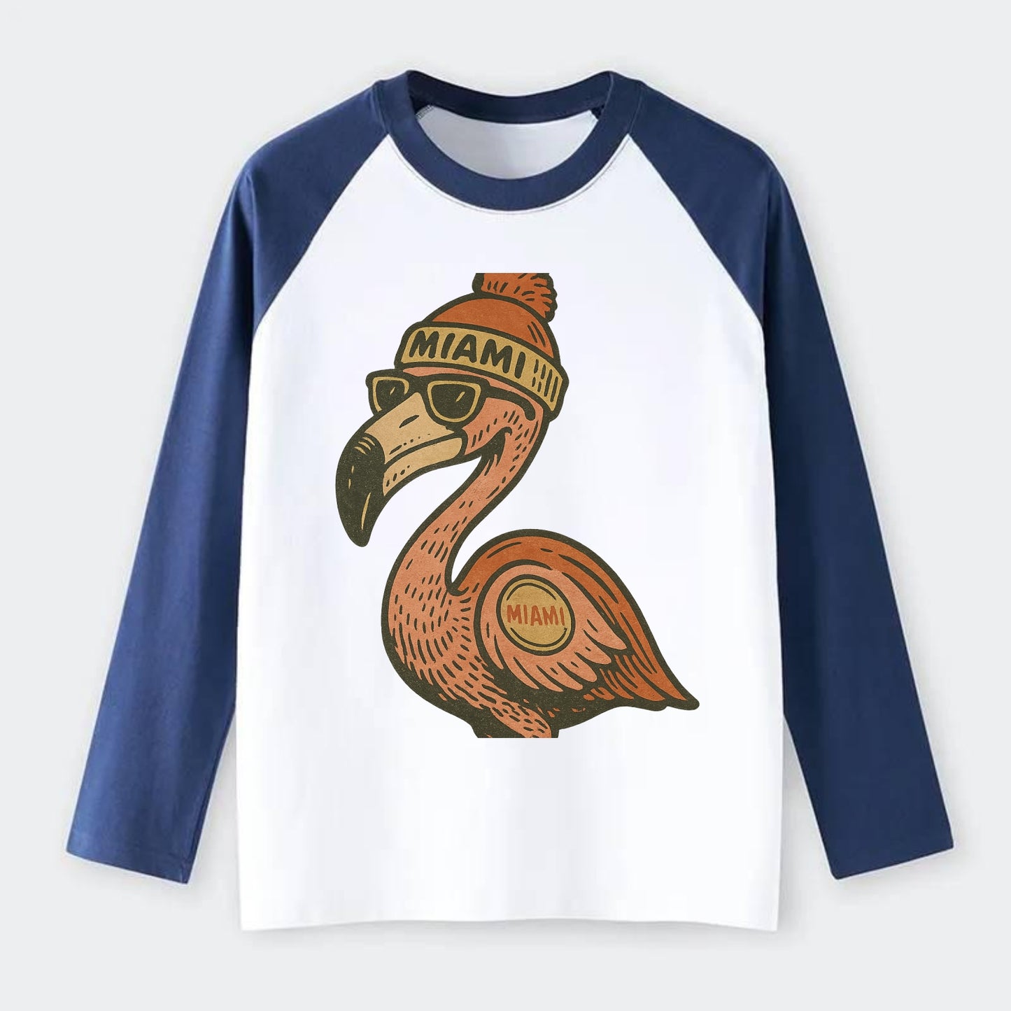 Miami Flamingo wearing Miami beanie with pom pom and wayfarer - Raglan Long Sleeve T-Shirt - Blue