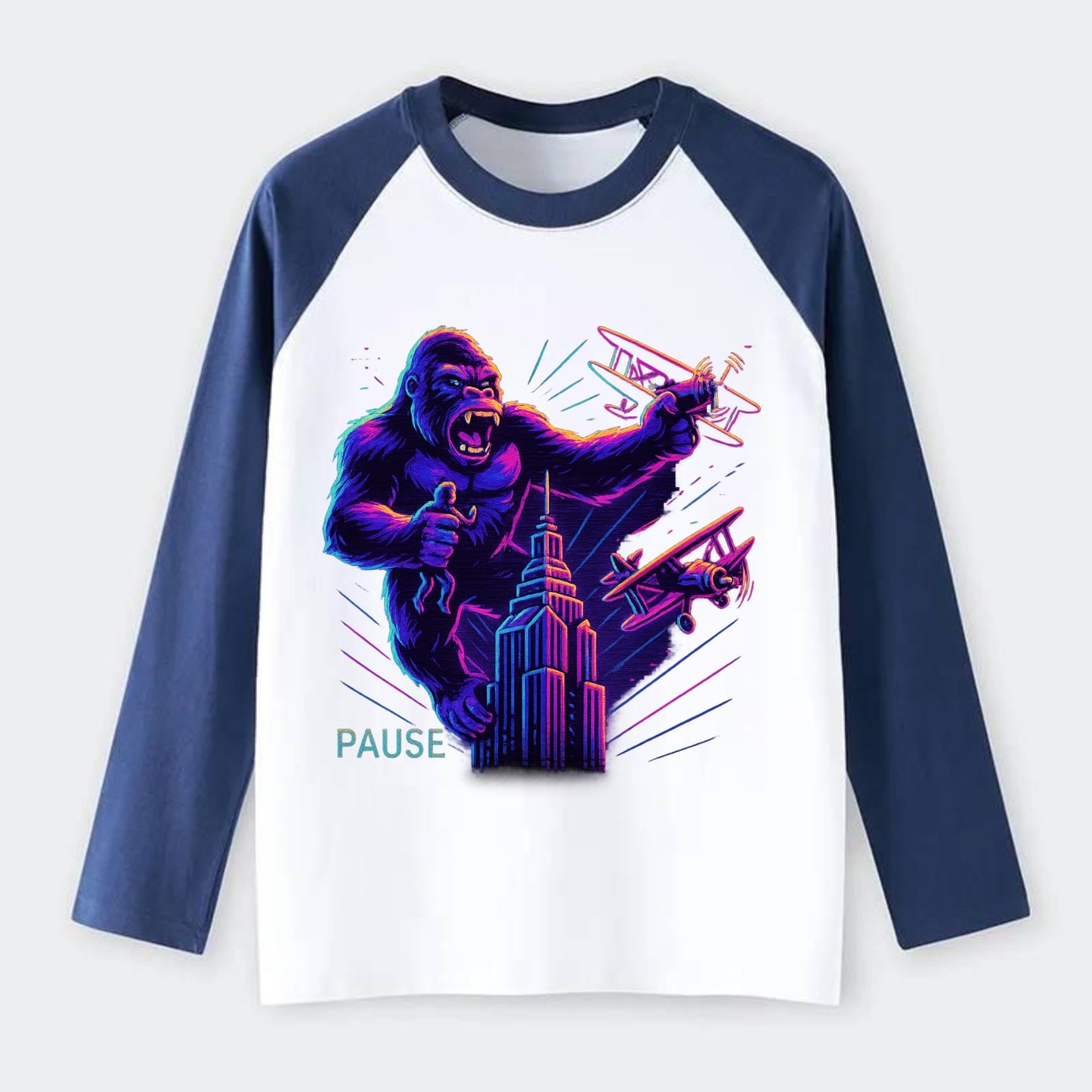 giant gorilla on top of skyscraper holding small figure, swatting - Raglan Long Sleeve T-Shirt - Blue