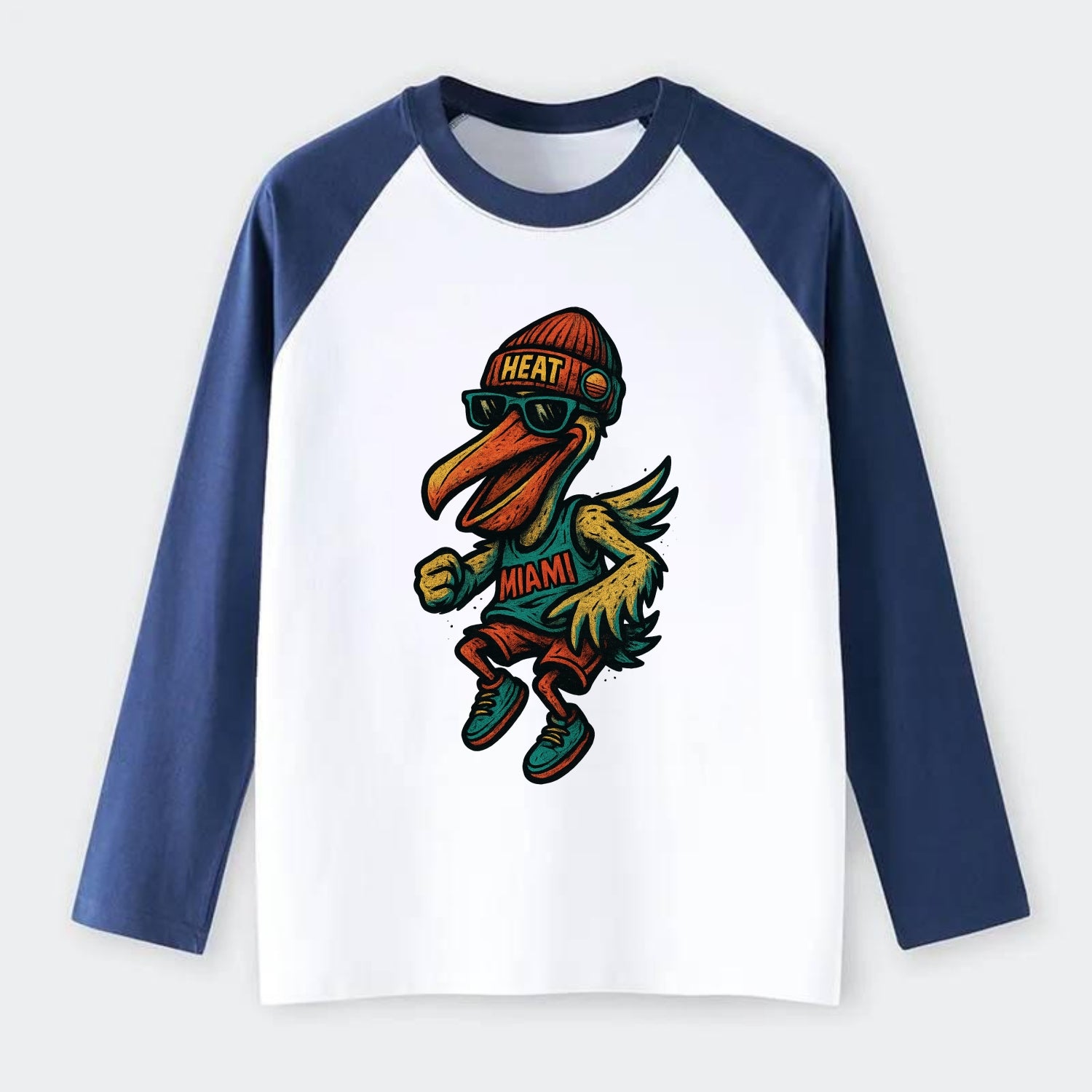 Miami Pelican wearing Heat beanie with sunset patch and wayfarer - Raglan Long Sleeve T-Shirt - Blue