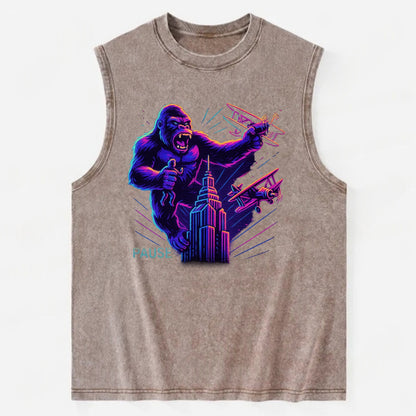 giant gorilla on top of skyscraper holding small figure, swatting planes - Vintage Washed Tank - Brown