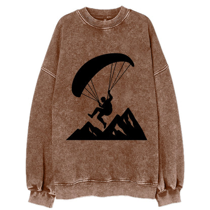Paraglider soaring over mountain peaks - Vintage Sweatshirt - Brown