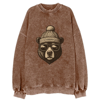 New Mexico Black Bear wearing Albuquerque beanie with pom pom and wayfarer - Vintage Sweatshirt - Brown