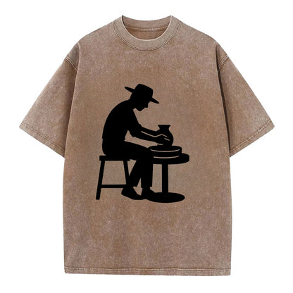 Potter shaping clay on wheel - Vintage T-shirt - Brown