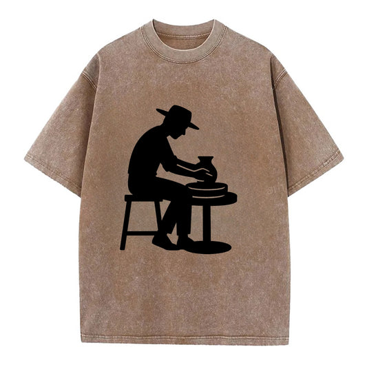 Potter shaping clay on wheel - Vintage T-shirt - Brown